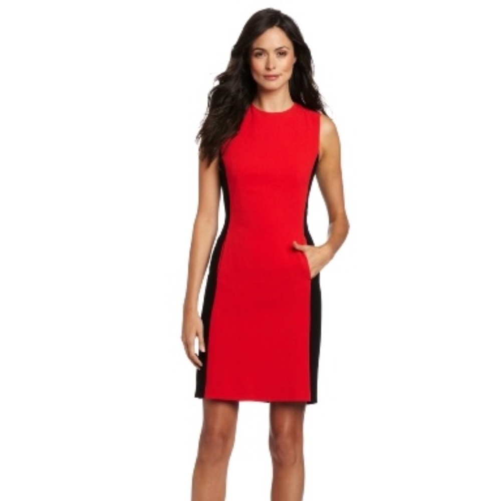 Cache dress in red and black, with gold zipper in the back.